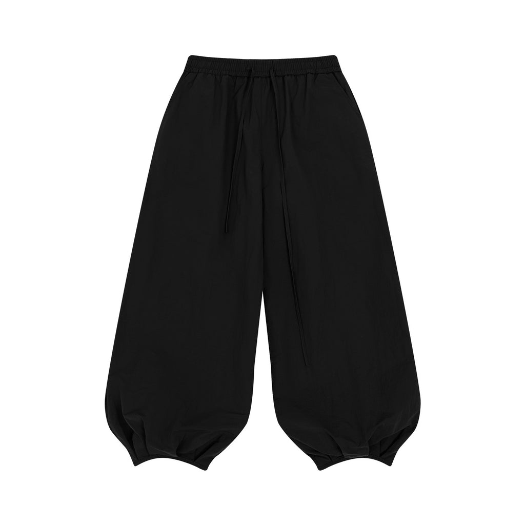 Wrinkled Textured And Pleated Slacks by Ricaloux