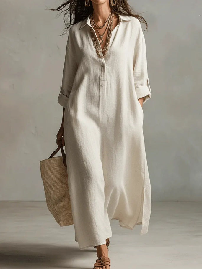 A Beige Linen Shirt Dress With A Relaxed French Vacation Vibe, Featuring A Turned-down Collar With A Half-placket, Rolled-up Sleeves, Side-slit Pockets, And A Long Shirt Dress Designperfect For Trave by Ricaloux