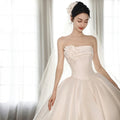A Strapless Dress With A Big Train - RICALOUX