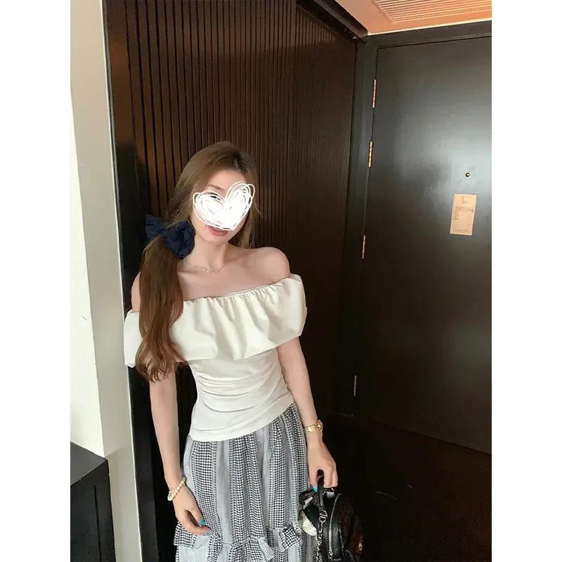 Stunning Pink Off-shoulder Top With A Boat Neckline And Ruffled Short Sleeves by Ricaloux