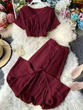 V-neck Single-breasted Short-sleeve Top And High-waisted Wide-leg Pants With Side Slits by Ricaloux