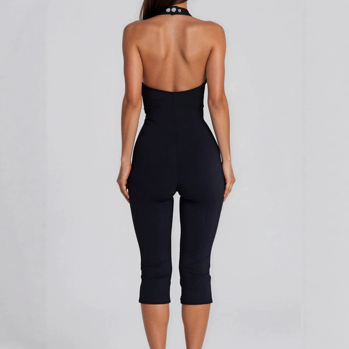 Halter-neck Metal-hole Tight Capri Jumpsuit by Ricaloux