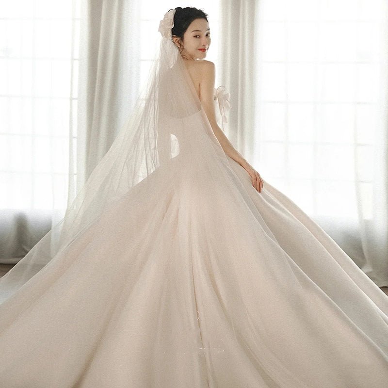 A Strapless Dress With A Big Train - RICALOUX