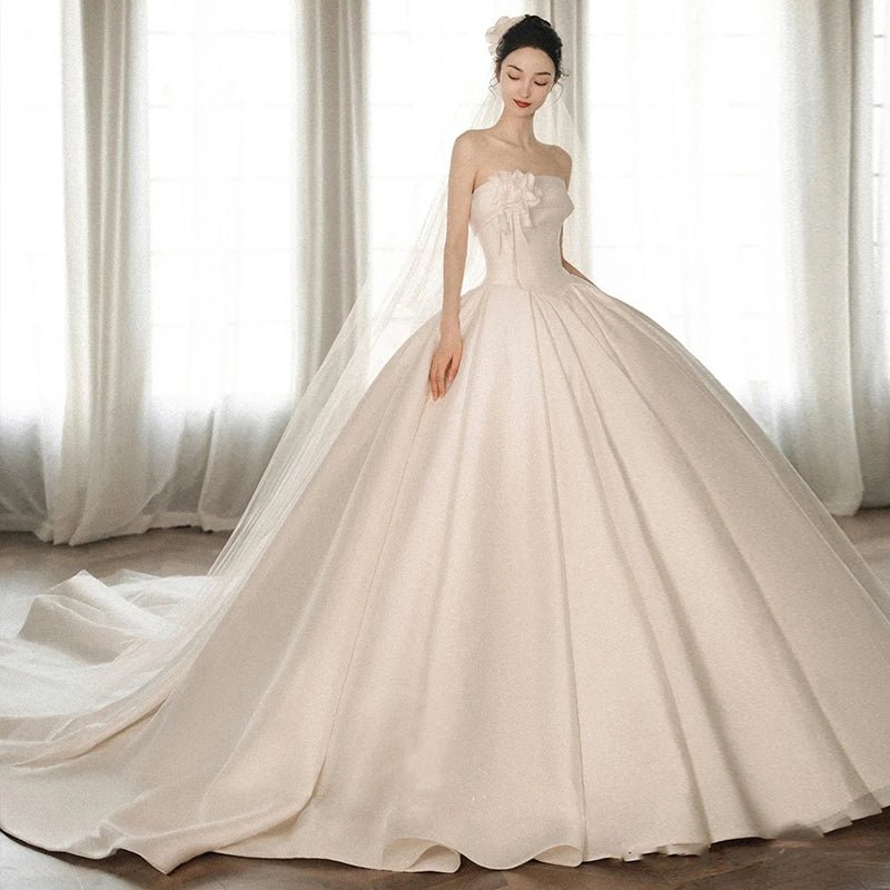 A Strapless Dress With A Big Train - RICALOUX