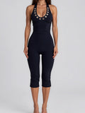 Halter-neck Metal-hole Tight Capri Jumpsuit by Ricaloux